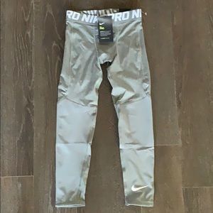 Boys Nike compression tights.